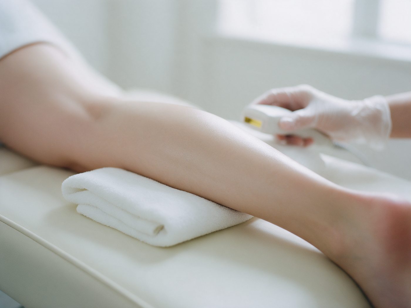 Smooth skin resting on a cream treatment bed after a hair removal treatment